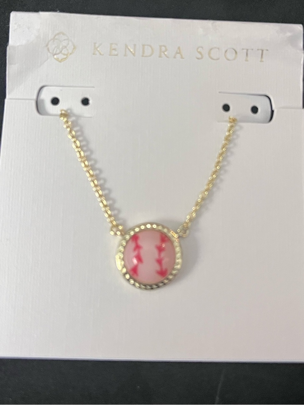 Kendra Scott Gold Necklace with Pink Pendant and Red Stitch Detail